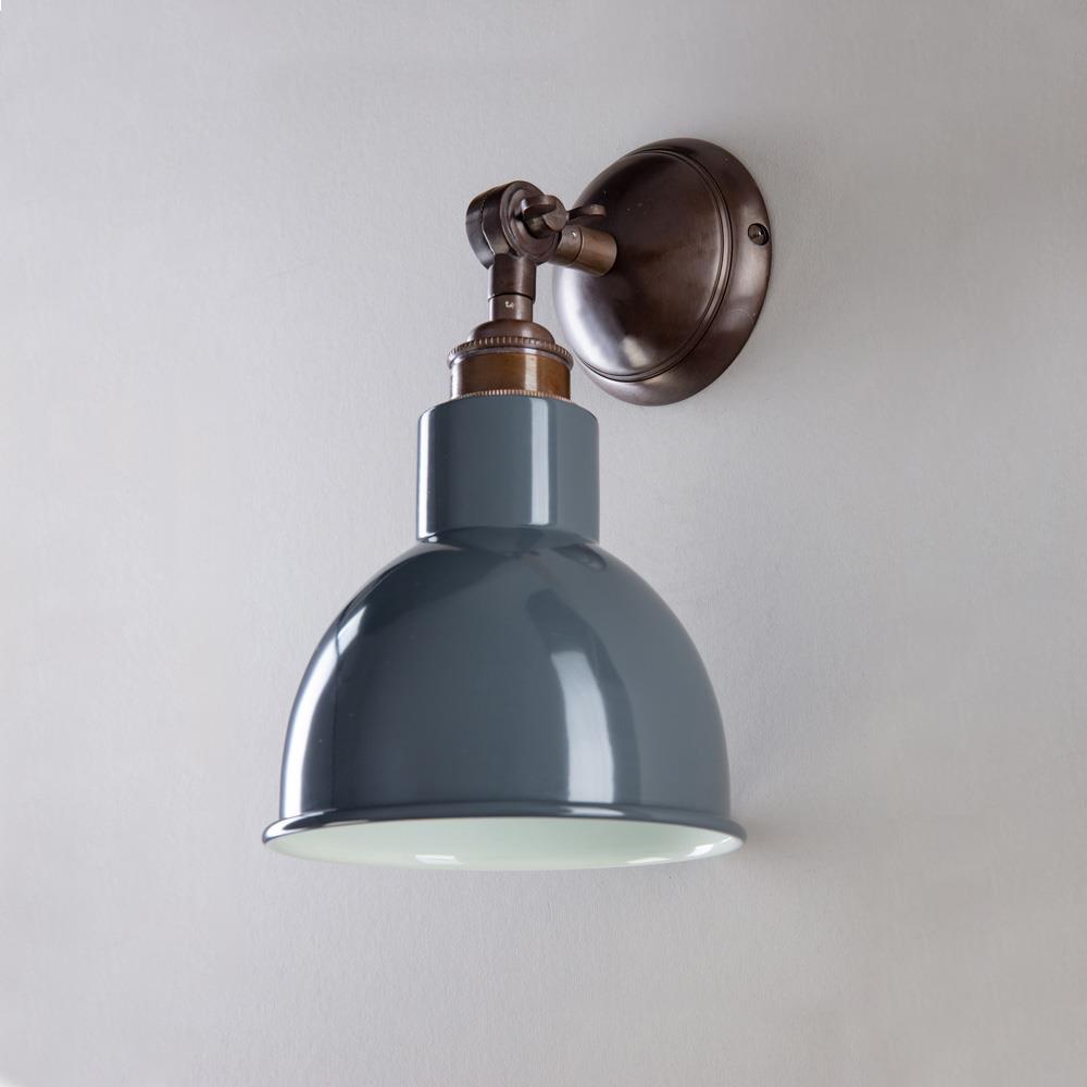 An Old School Electric Churchill Short Arm Wall Light blue shade light fitting.