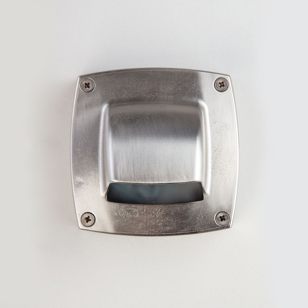 An Old School Electric Square Outdoor Path Light fixture on a white wall.