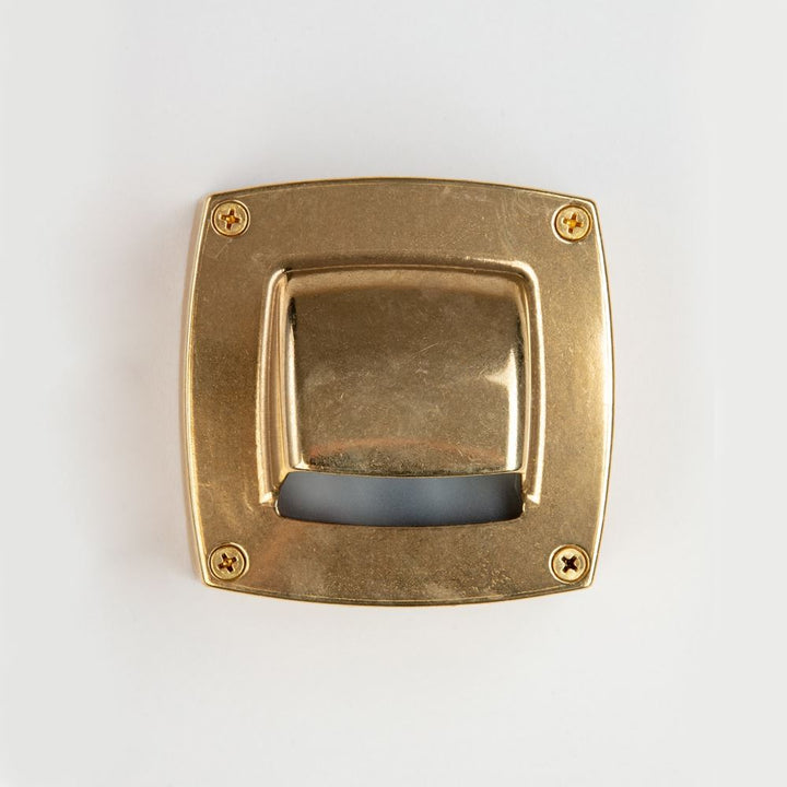 An Old School Electric Square Outdoor Path Light on a white surface.